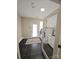 Bright laundry room with LG washer and dryer, white cabinets, dark floors and natural light at 2905 Medlin Rd # 40 Acres, Monroe, NC 28112