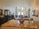 Open floor plan showcases the dining area and living room, blending seamlessly at 2905 Medlin Rd # 40 Acres, Monroe, NC 28112