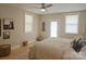 Bright bedroom with a ceiling fan, natural light, and wooden floors at 2905 Medlin Rd # 40 Acres, Monroe, NC 28112
