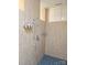 Modern shower with tiled walls, a rainfall showerhead, and built-in shelving at 2905 Medlin Rd # 40 Acres, Monroe, NC 28112