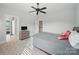 Bright bedroom showcasing a grey dresser, with a connecting room, and neutral-colored walls and carpet at 3007 Arsdale Rd, Waxhaw, NC 28173