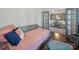Cozy bedroom features a daybed, ample natural light, and hardwood floors at 3007 Arsdale Rd, Waxhaw, NC 28173