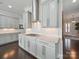 Modern kitchen with sleek cabinetry, stone countertops, stainless steel appliances, and gas cooktop at 3007 Arsdale Rd, Waxhaw, NC 28173