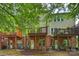 Rear exterior showing back decks of the home at 3014 Castleberry Ct, Charlotte, NC 28209