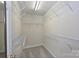 Walk-in closet is equipped with wire shelving for optimal storage and organization at 3014 Castleberry Ct, Charlotte, NC 28209