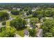 An aerial shot of the home shows it nestled in a vibrant community with lush green surroundings at 310 S Jacob St, Cherryville, NC 28021