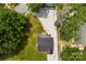 Bird's eye view features the house with a dark roof, a gravel driveway, and mature landscaping at 310 S Jacob St, Cherryville, NC 28021