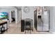 Eat-in kitchen features stainless steel appliances, light gray walls, and hard wood floors at 310 S Jacob St, Cherryville, NC 28021