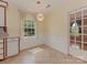 Cozy breakfast nook with chandelier, window, and doorway to another room at 3408 Oak Tree Trl, Matthews, NC 28105