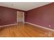 Spacious living room with hardwood floors and ample natural light at 3408 Oak Tree Trl, Matthews, NC 28105
