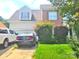 Two-story house with brick and vinyl exterior, attached garage, and landscaping at 3509 Joel Turner Dr, Charlotte, NC 28216
