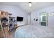 Spacious bedroom with vaulted ceilings and a convenient walk-in closet/bathroom at 3702 Brookstone Trl, Indian Trail, NC 28079