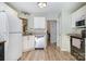 Functional kitchen with white cabinetry, stainless steel appliances, and a practical layout for efficient cooking at 3702 Brookstone Trl, Indian Trail, NC 28079