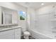 Full bathroom features a shower and tub combination, granite countertops and a large mirror at 510 3Rd St, Salisbury, NC 28144