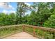 Wooden deck offers peaceful views of surrounding greenery at 510 3Rd St, Salisbury, NC 28144