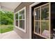 Close up of a charming two-story home featuring a gray and white exterior and front door at 510 3Rd St, Salisbury, NC 28144