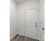 Hallway view showing interior and exterior doors and hard surface flooring at 510 3Rd St, Salisbury, NC 28144