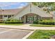 Inviting clubhouse with stone accents, lush landscaping and ample parking for residents and guests at 513 Meadow Ridge Dr, Belmont, NC 28012