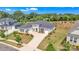 Stunning single story home with well manicured lawn, elegant landscaping, and a long concrete driveway at 513 Meadow Ridge Dr, Belmont, NC 28012