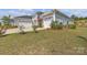 Eye-level view of home showing well-maintained landscaping and three-car garage at 513 Meadow Ridge Dr, Belmont, NC 28012