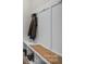 Functional mudroom with built-in bench, storage cubbies, and coat hooks at 513 Meadow Ridge Dr, Belmont, NC 28012