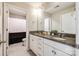 Bathroom features a double granite vanity with white cabinets, tile floor, and a separate toilet and shower area at 5635 Agora Ct, Lancaster, SC 29720