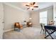 Neutral bedroom with carpeted floors, natural light and comfortable seating at 5635 Agora Ct, Lancaster, SC 29720