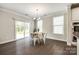 Bright breakfast nook with sliding glass door and hardwood floors, ideal for casual dining at 5635 Agora Ct, Lancaster, SC 29720