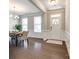 Elegant foyer featuring hardwood floors, wainscoting, and a welcoming front door at 5635 Agora Ct, Lancaster, SC 29720