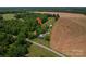 Expansive property featuring a beautiful home, pool, and wooded areas at 5958 Hoover Elmore Rd, Lincolnton, NC 28092