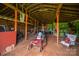 Barn interior showcasing ample storage space with lawn equipment at 5958 Hoover Elmore Rd, Lincolnton, NC 28092