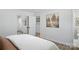 Spacious bedroom offers closet space and calming wall art at 6127 Eagle Peak Dr, Charlotte, NC 28214