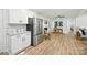 Bright, updated kitchen flows into an open living space with stainless appliances and granite countertops at 6127 Eagle Peak Dr, Charlotte, NC 28214