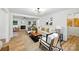 Bright living room with modern decor, hardwood floors, fireplace and an open floor plan at 6127 Eagle Peak Dr, Charlotte, NC 28214