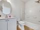Cozy bathroom with white cabinetry, tile floor, and bathtub shower combo at 7130 Founders Club Ct, Charlotte, NC 28269