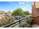 Spacious brick balcony with planters overlooking tree-lined street at 720 Governor Morrison St # 219, Charlotte, NC 28211
