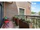 Cozy brick balcony with stylish planters and outdoor seating at 720 Governor Morrison St # 219, Charlotte, NC 28211