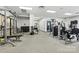 Community gym featuring various weight training machines, benches, and free weights at 720 Governor Morrison St # 219, Charlotte, NC 28211