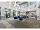 Community clubhouse with comfortable seating and a modern fireplace at 720 Governor Morrison St # 219, Charlotte, NC 28211