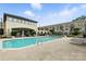 Outdoor community pool with lounge chairs and manicured landscaping at 720 Governor Morrison St # 219, Charlotte, NC 28211