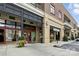 Street view of shops at the complex, featuring storefronts, entrances, and sidewalk at 720 Governor Morrison St # 219, Charlotte, NC 28211