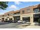 Exterior shot of retail stores with parking and visible signage, like Firebirds and Naturepedic at 720 Governor Morrison St # 219, Charlotte, NC 28211