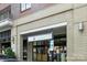 Exterior shot of a winestore featuring visible signage and storefront at 720 Governor Morrison St # 219, Charlotte, NC 28211