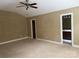 Bedroom featuring neutral carpet and an ensuite bathroom with a vanity at 9177 Bonnie Briar Cir, Charlotte, NC 28277