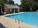 Inviting community pool features a bathhouse, seating and convenient access for residents to relax and enjoy at 9177 Bonnie Briar Cir, Charlotte, NC 28277