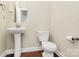 Cozy powder room featuring a pedestal sink at 10004 Perth Moor Rd, Charlotte, NC 28278