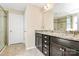 Bathroom with double vanity, granite countertop, and glass-enclosed shower at 10004 Perth Moor Rd, Charlotte, NC 28278