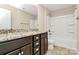 Bathroom featuring double sinks, granite countertops and a shower-tub combination at 10004 Perth Moor Rd, Charlotte, NC 28278