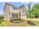 Charming two-story home boasts manicured landscaping and a welcoming entrance at 10004 Perth Moor Rd, Charlotte, NC 28278