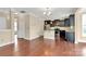 Open concept living room featuring an eat in kitchen and a dining area at 10004 Perth Moor Rd, Charlotte, NC 28278